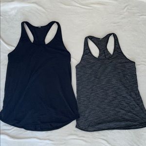 Two Lululemon loose fit tanks